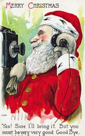 Carte postale du père Noël à l'aide de téléphone