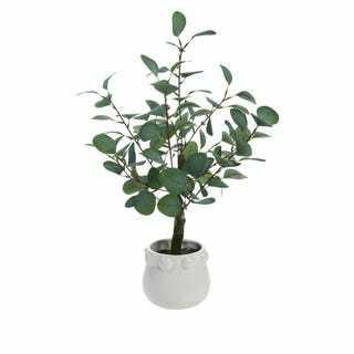 Faux eucalyptus dans un pot en céramique