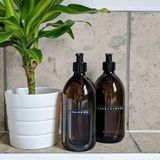 Bouteilles en verre de shampooing et revitalisant, Wearth London