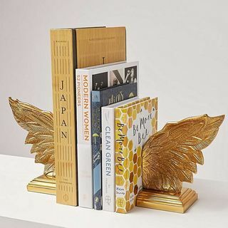 Serre-livres dorés à ailes métalliques